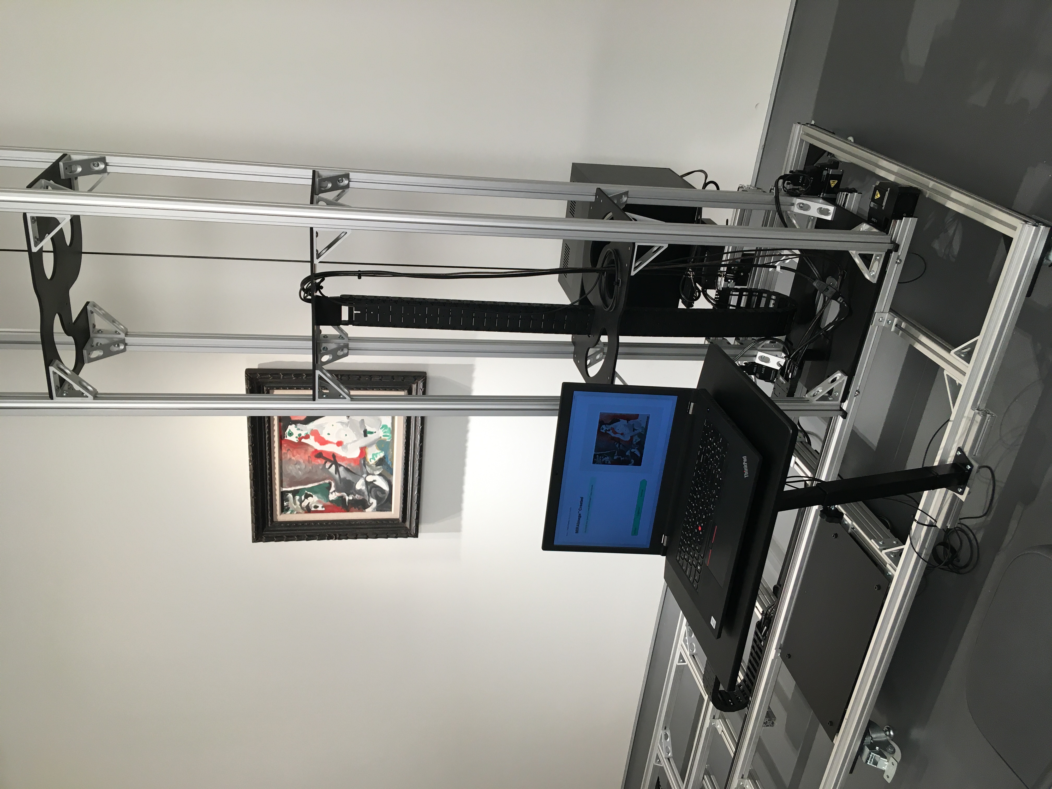 Robotic gantry scanning a painting